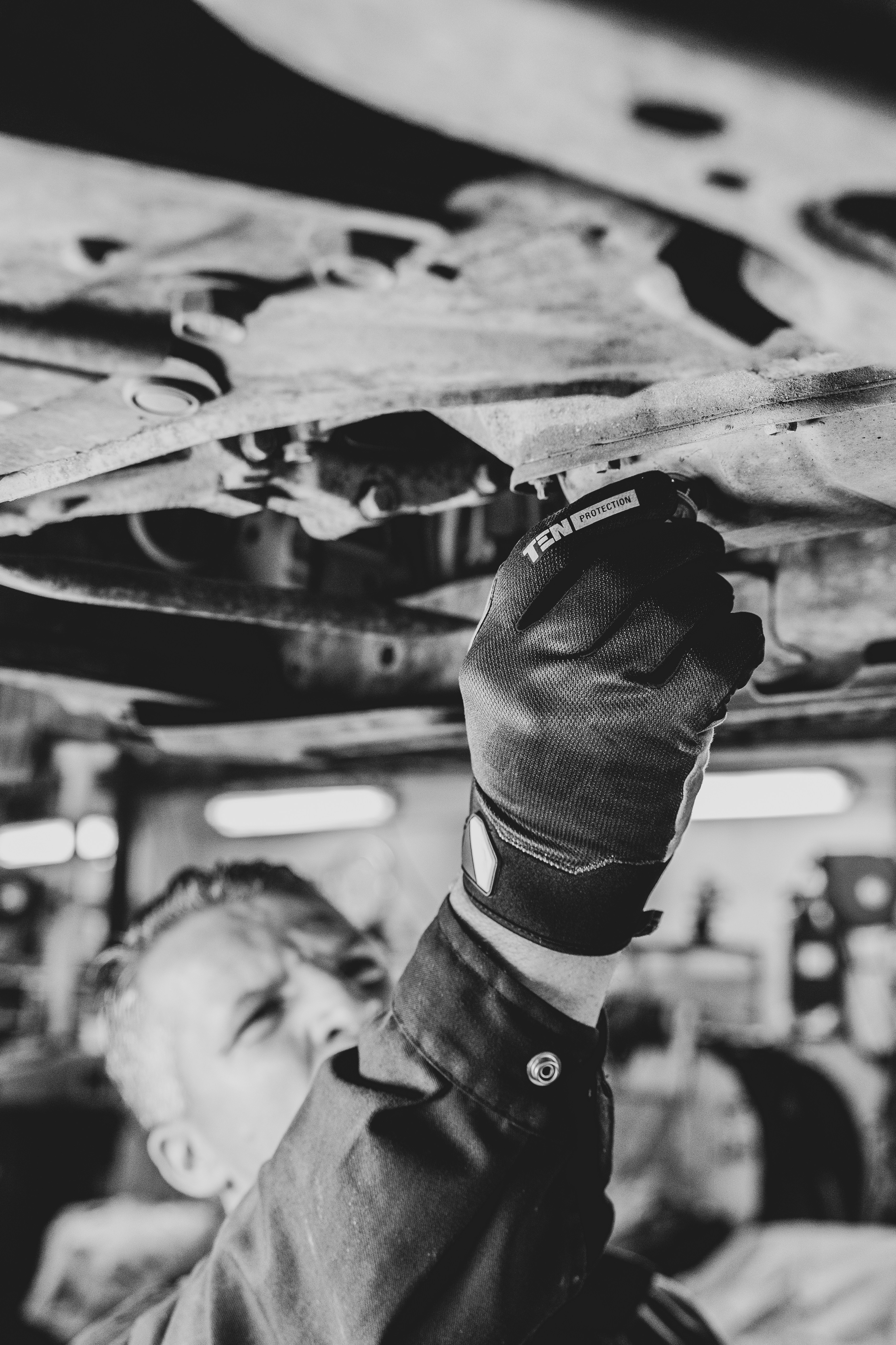 Mechanic working on brakes